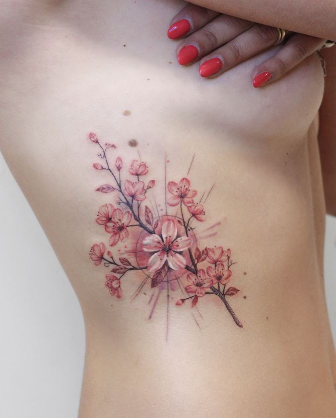 Tatouage Fleur De Cerisier Géométrique Sur La Côte 