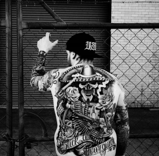 Tatouage Crâne Armé 